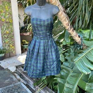 Strapless plaid fit, and flare dress.